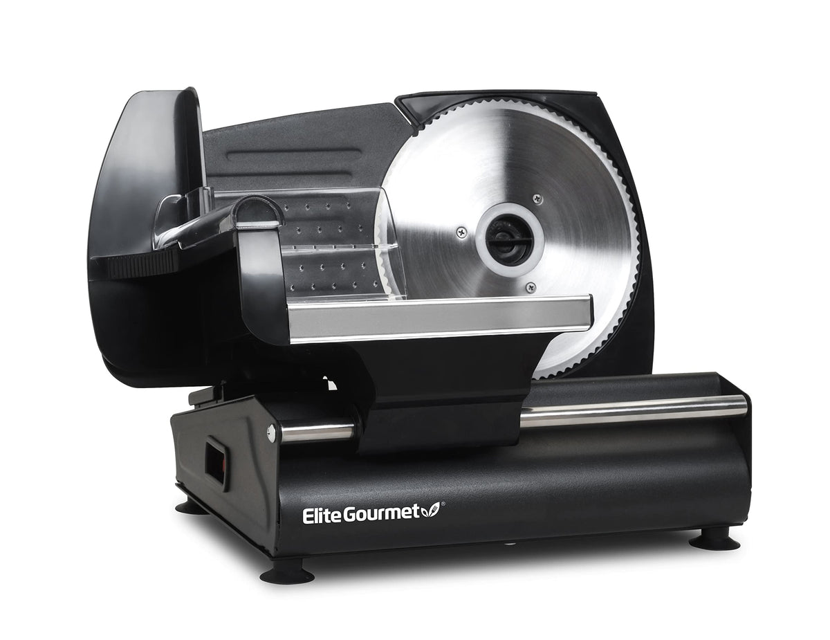 Elite Gourmet EMT-625B slicer on kitchen counter showing precision cutting for thin deli slices.