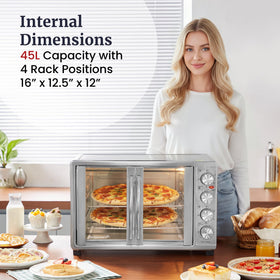 Elite Gourmet ETO-4510M interior showing rotisserie assembly for even roasting
