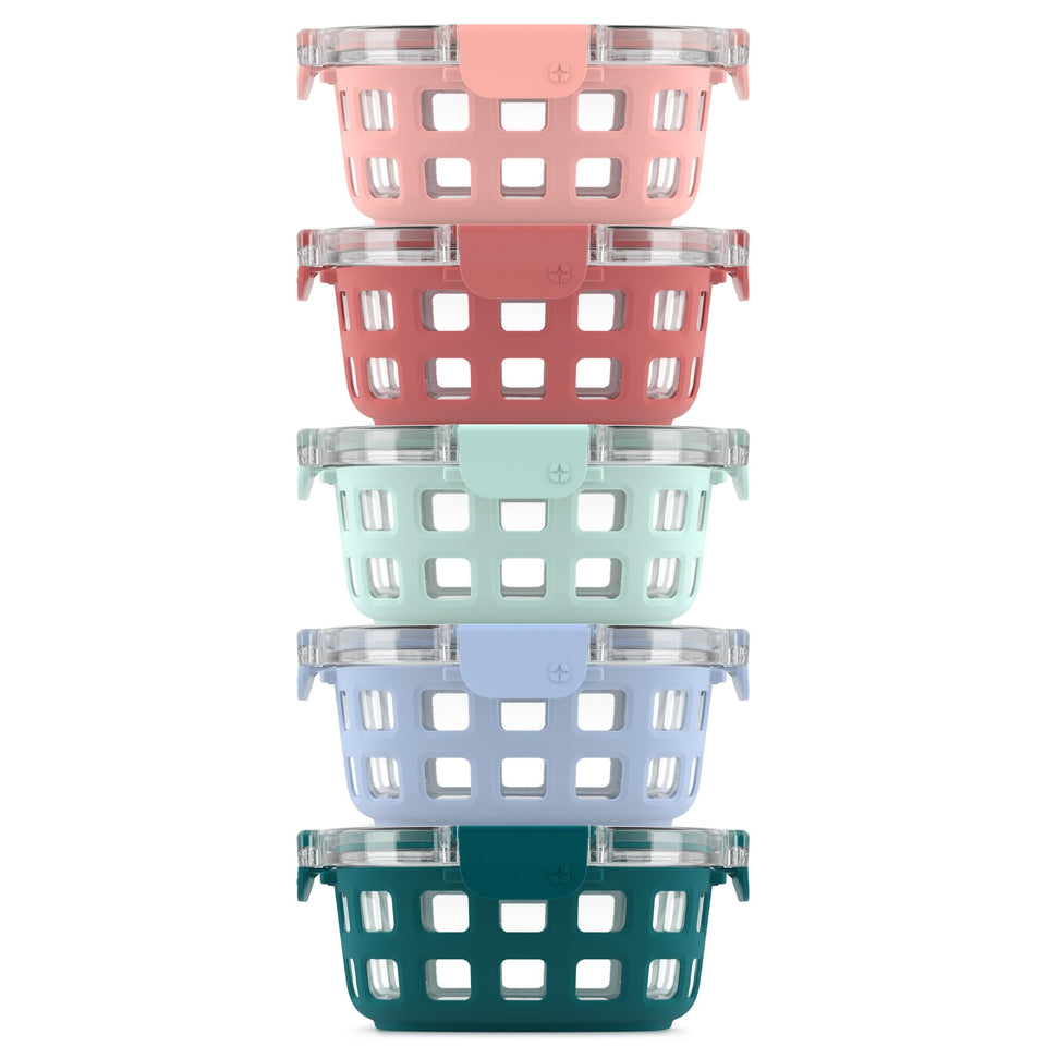 Ello Duraglass 3.4 cup round meal prep container with melon sleeve, easy to see contents.