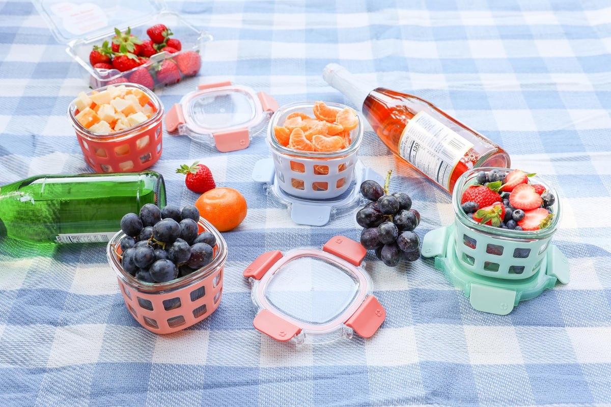 Ello Duraglass leakproof lids helping keep foods fresh and preventing spills.