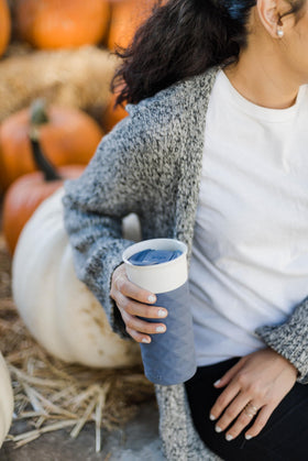 Ello Ogden mug with built-in silicone coaster base for surface protection.