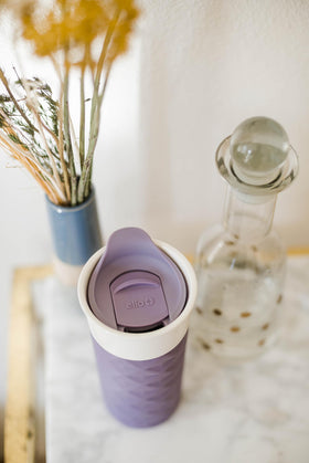 Ello Ogden splash lid slider lets you sip directly from ceramic while staying splash-resistant.