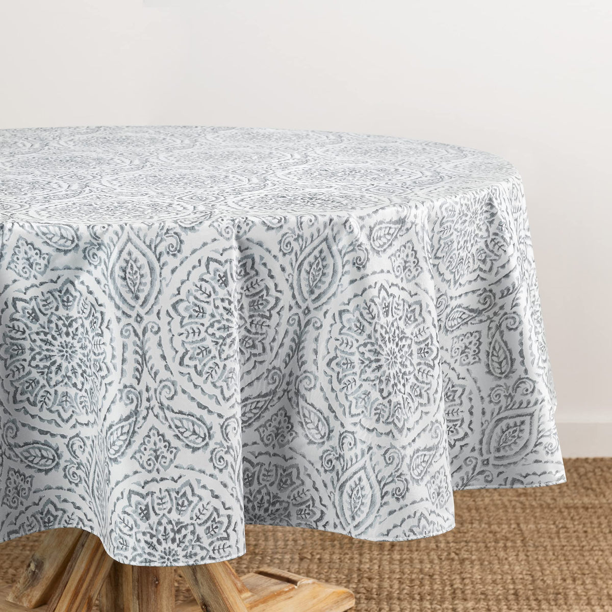 Elrene Savannah boho paisley oval gray tablecloth adds stylish protection.