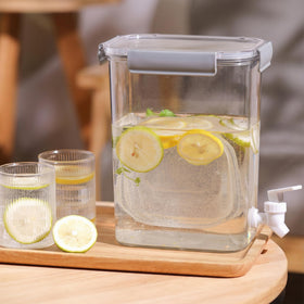 Refrigerator-friendly drink dispenser keeps beverages chilled and accessible for guests.