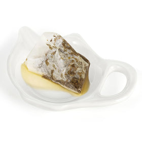 Elsjoy compact teapot-shaped coaster adds charm to any tea service.