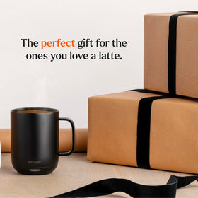 Ember Mug 2 10 oz held in hand for comfortable grip.