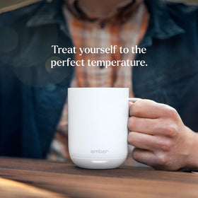 Ember Mug 2 on a desk in an office setting for daily use.