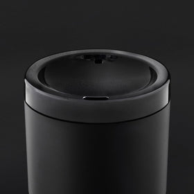 Hand washing the Ember Sipping Lid demonstrates simple cleaning routine.