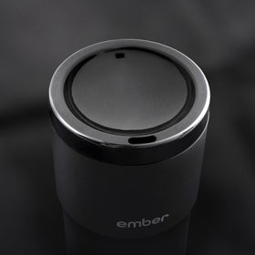 Ember Sipping Lid open and ready to sip during a busy morning.