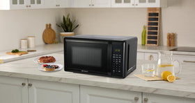 Emerson MW7302B touch-control panel for precise, quick heating.