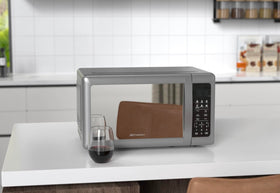 Emerson MW7601SL interior space fits a 12-inch plate for family meals.