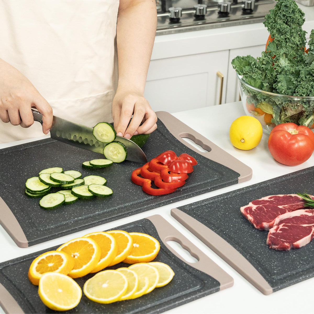Empune almond-gray cutting board set complements kitchen decor.