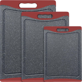 Empune extra-large cutting board in red, ideal for large prep tasks on the counter.