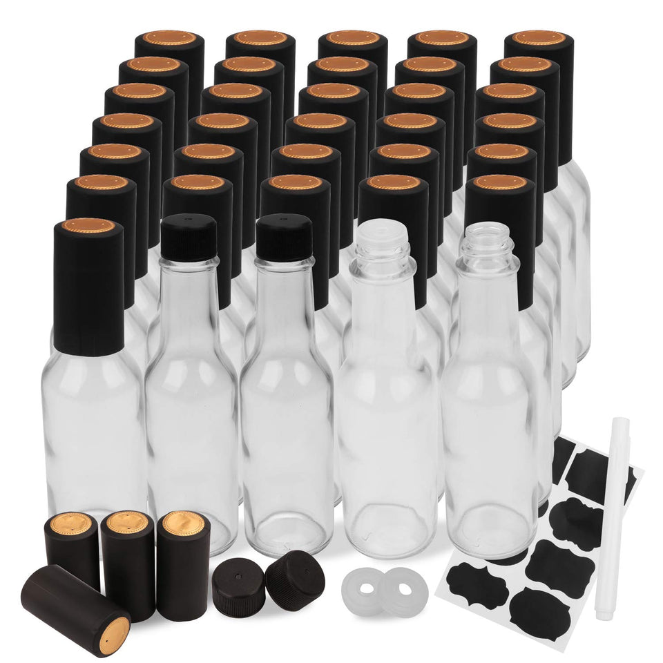 Encheng 5oz bottle with lid, clear glass for easy sauce visibility.