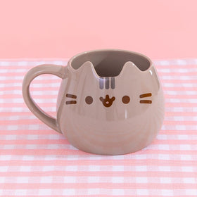 Enesco Pusheen sculpted mug close-up with glossy glaze highlighting details and whimsy.