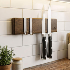 ENOKING magnetic knife strip with no dead zone safely holds knives on refrigerator.