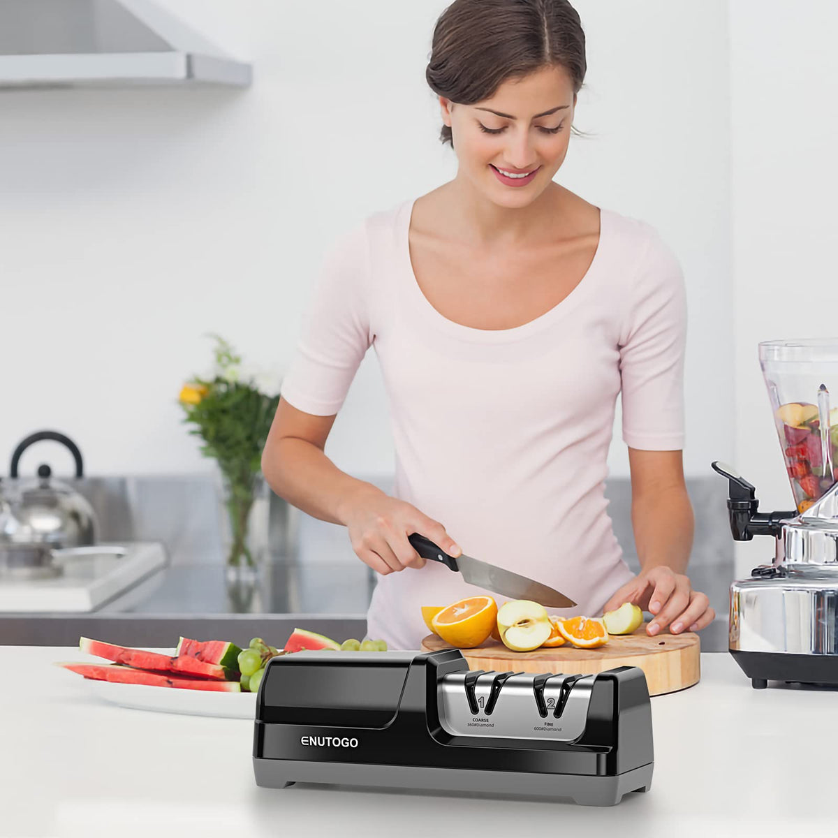 Enutogo knife sharpener post-use blade feels sharp for clean slicing.