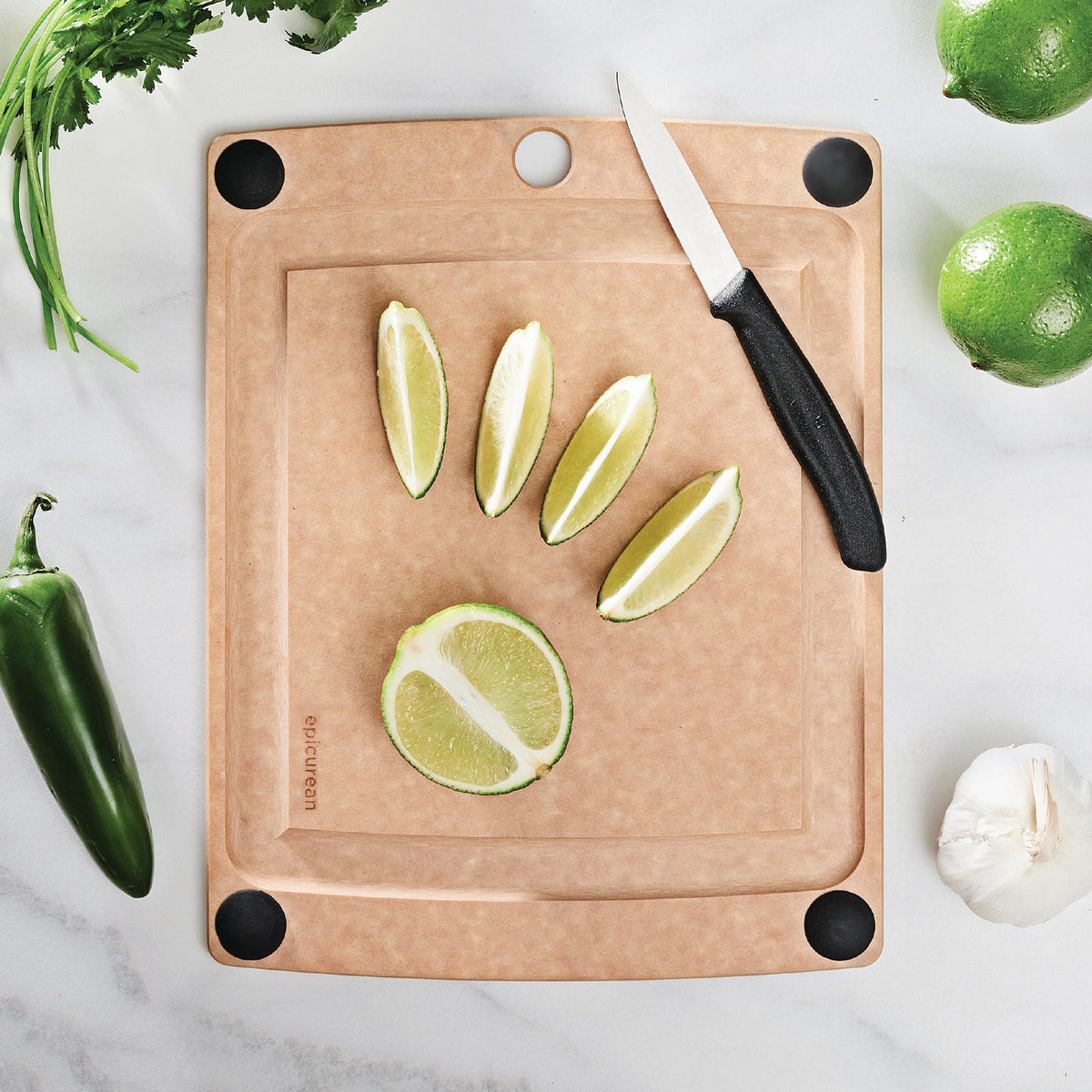 Epicurean All-In-One Cutting Board juice groove side catching liquids during chopping