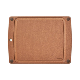 Epicurean All-In-One cutting board with juice groove catching liquids during prep.