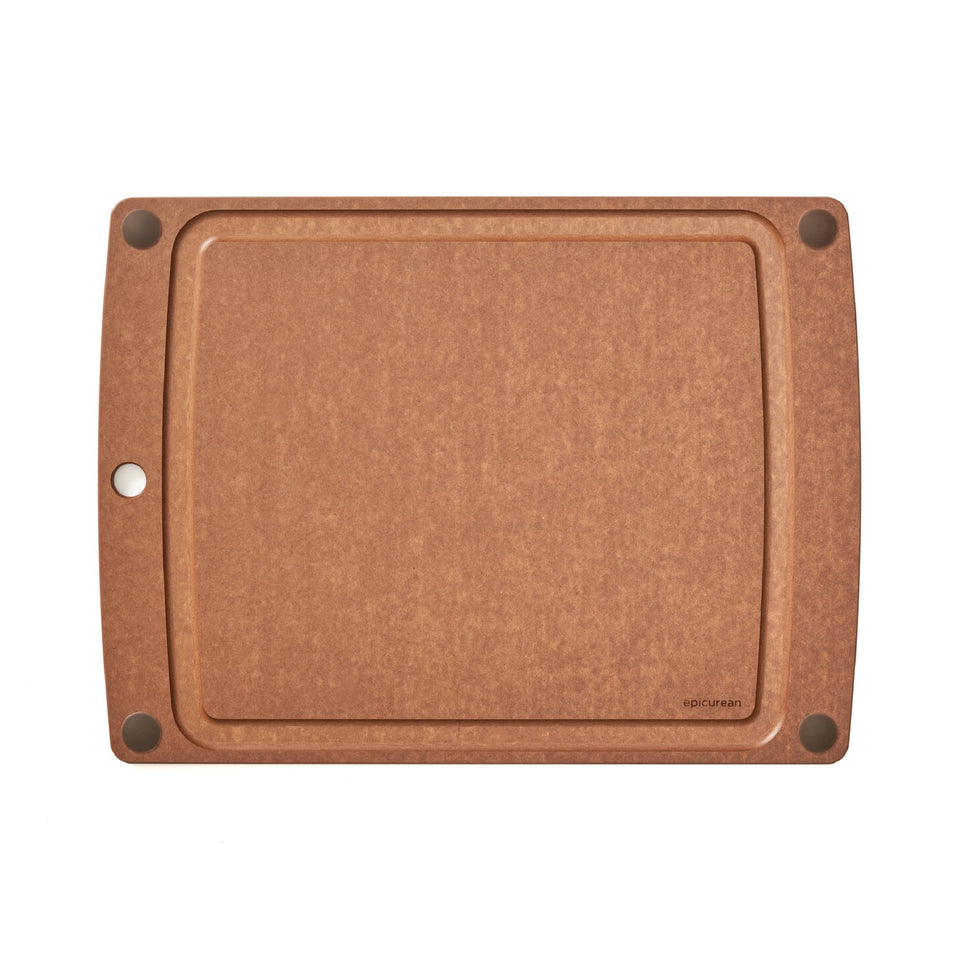 Epicurean All-In-One cutting board with juice groove catching liquids during prep.