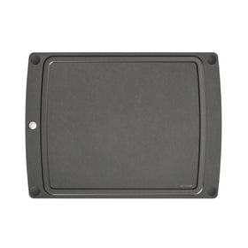 Epicurean All-In-One Cutting Board with juice groove catching liquids during prep.