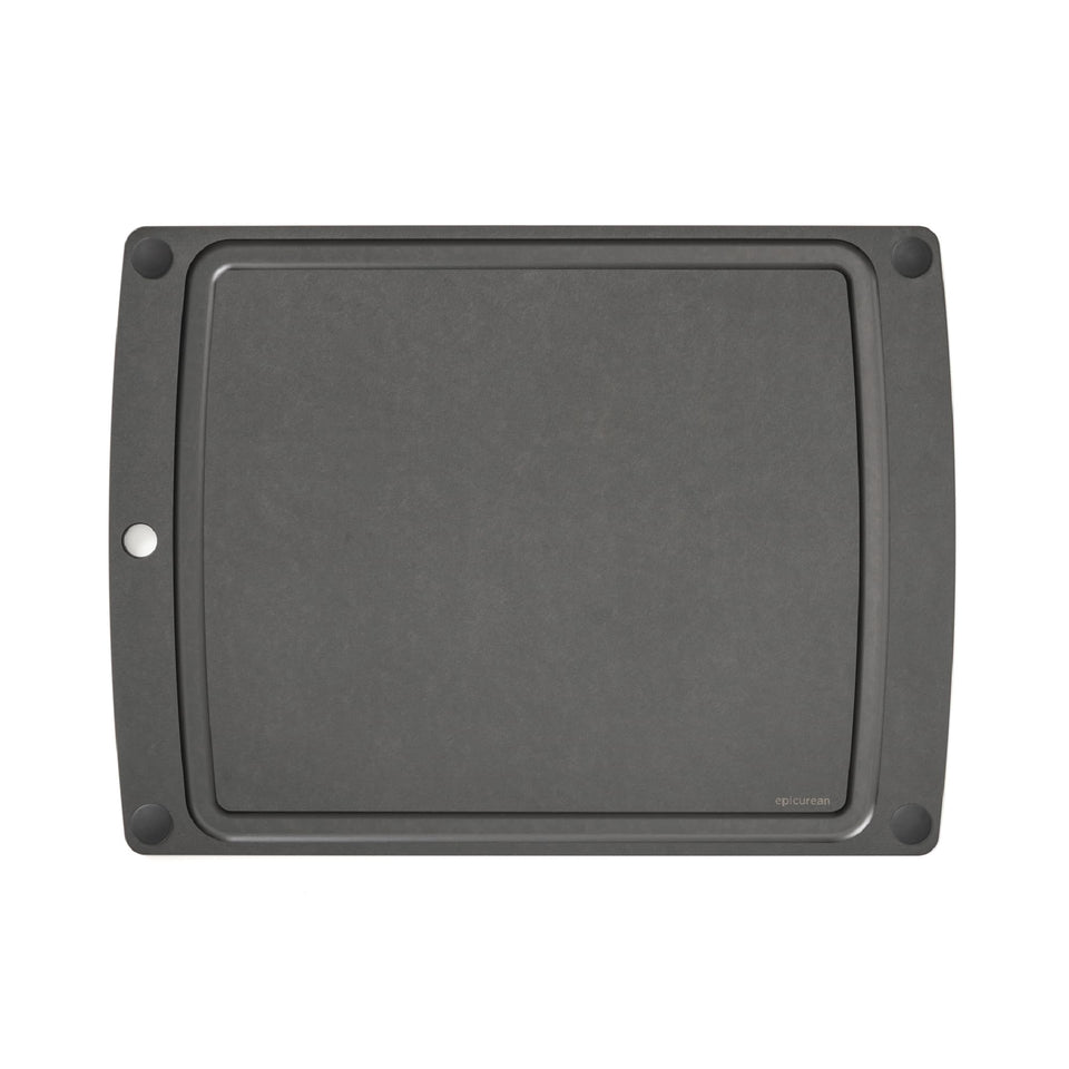 Epicurean All-In-One Cutting Board with juice groove catching liquids during prep.