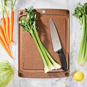 Epicurean All-In-One cutting board shows four non-slip feet for stability.