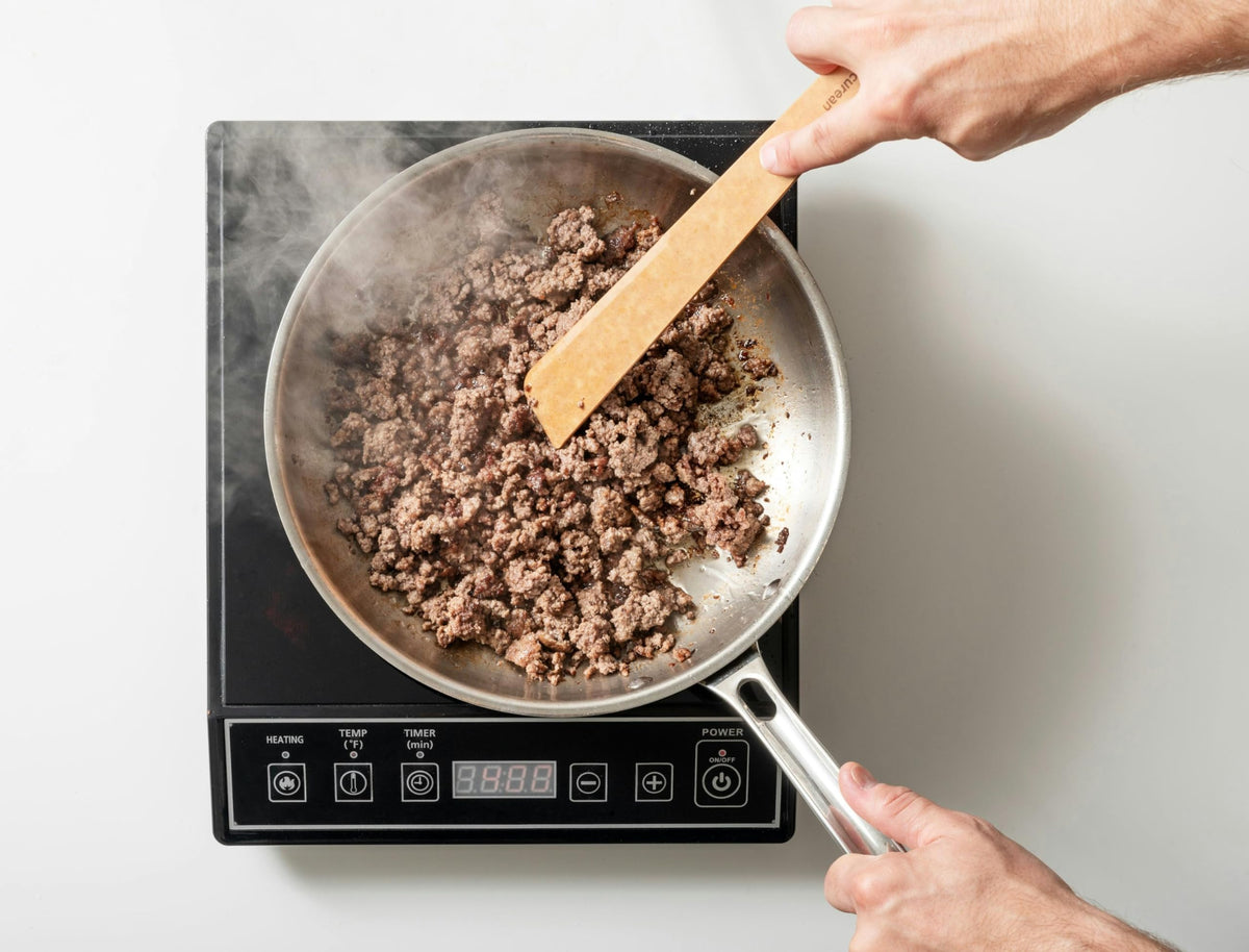 Epicurean Cool Tool on the countertop shows two color options and easy reach.