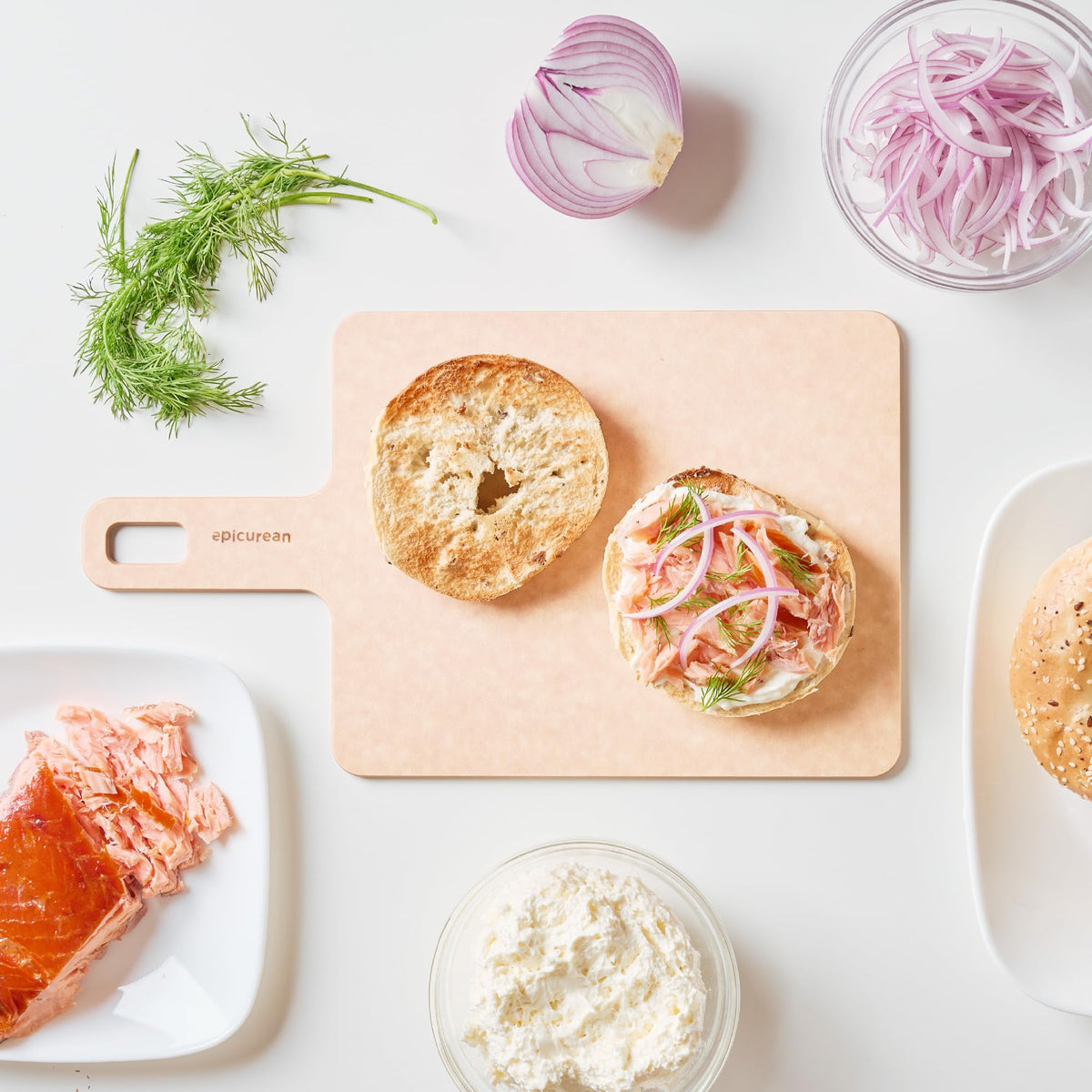 Long-handle Epicurean Handy Series board shown for chopping and serving indoors or outdoors.