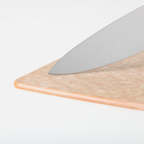 Epicurean heat-resistant up to 350°F doubles as a trivet