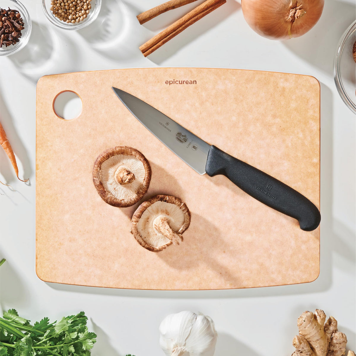 Epicurean cutting board natural on the counter, knife-friendly surface preserves blades while slicing.