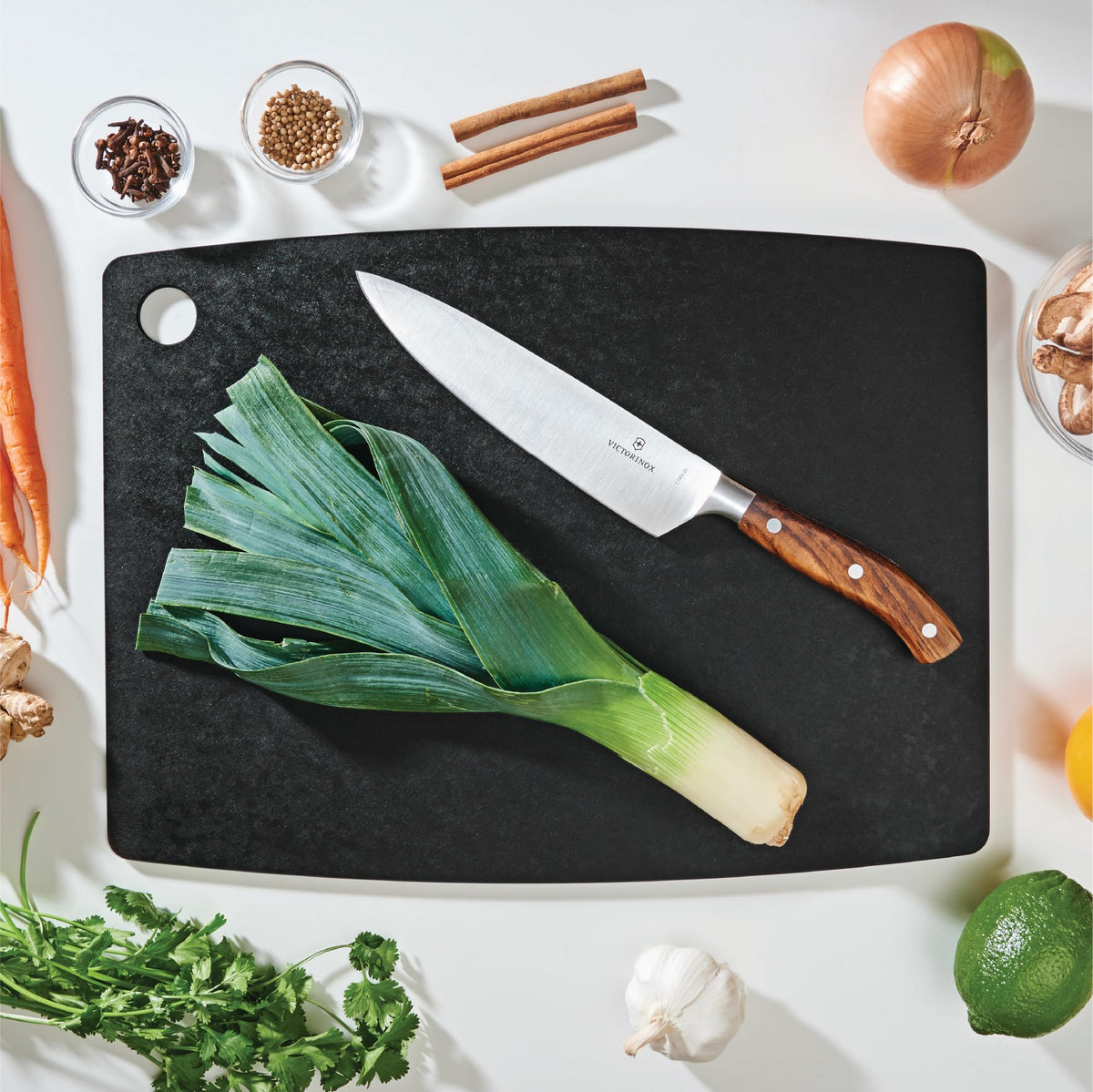 Epicurean cutting board in slate with dual sides for chopping and serving.