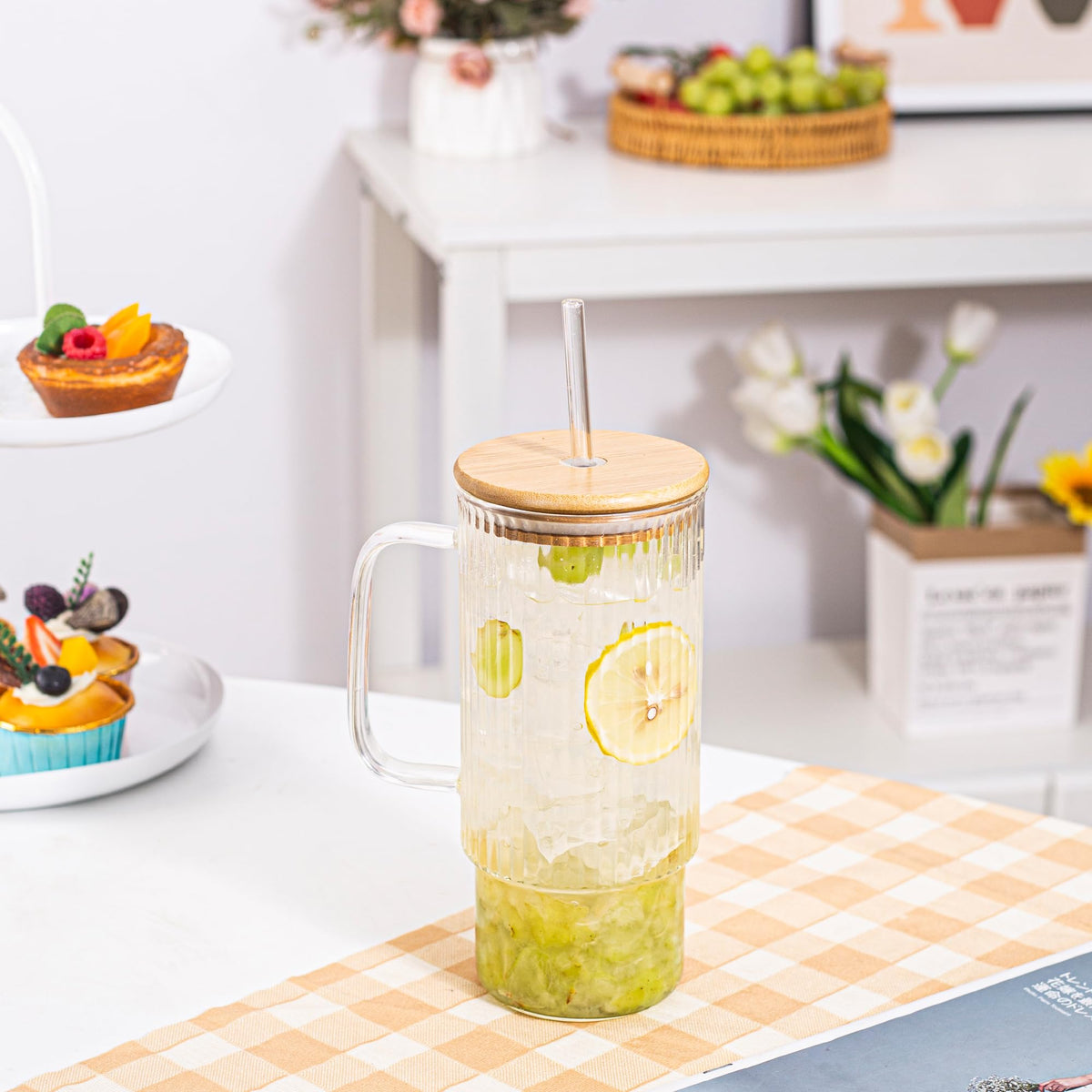 Erichbow ribbed glass tumbler with handle and lid for hot or cold drinks.