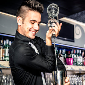 Esatto pour spout in use on a bottle for quick pours