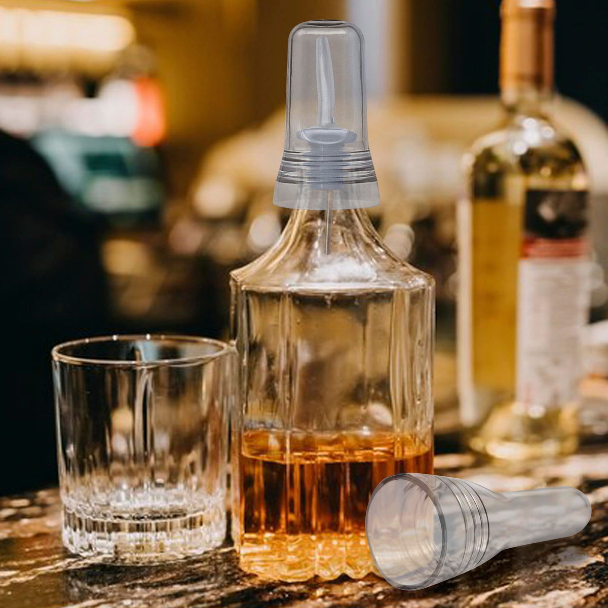 Esatto non-toxic pour spout covers keep bar surfaces clean and safe.