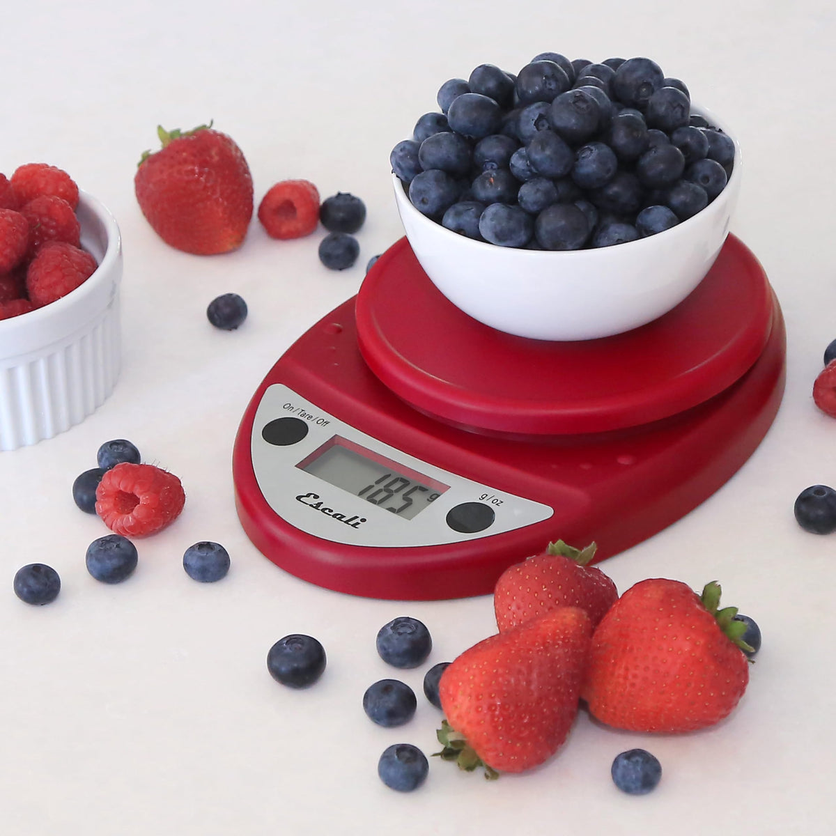 Escali Primo on the kitchen counter with a bowl showing spill-proof usability.