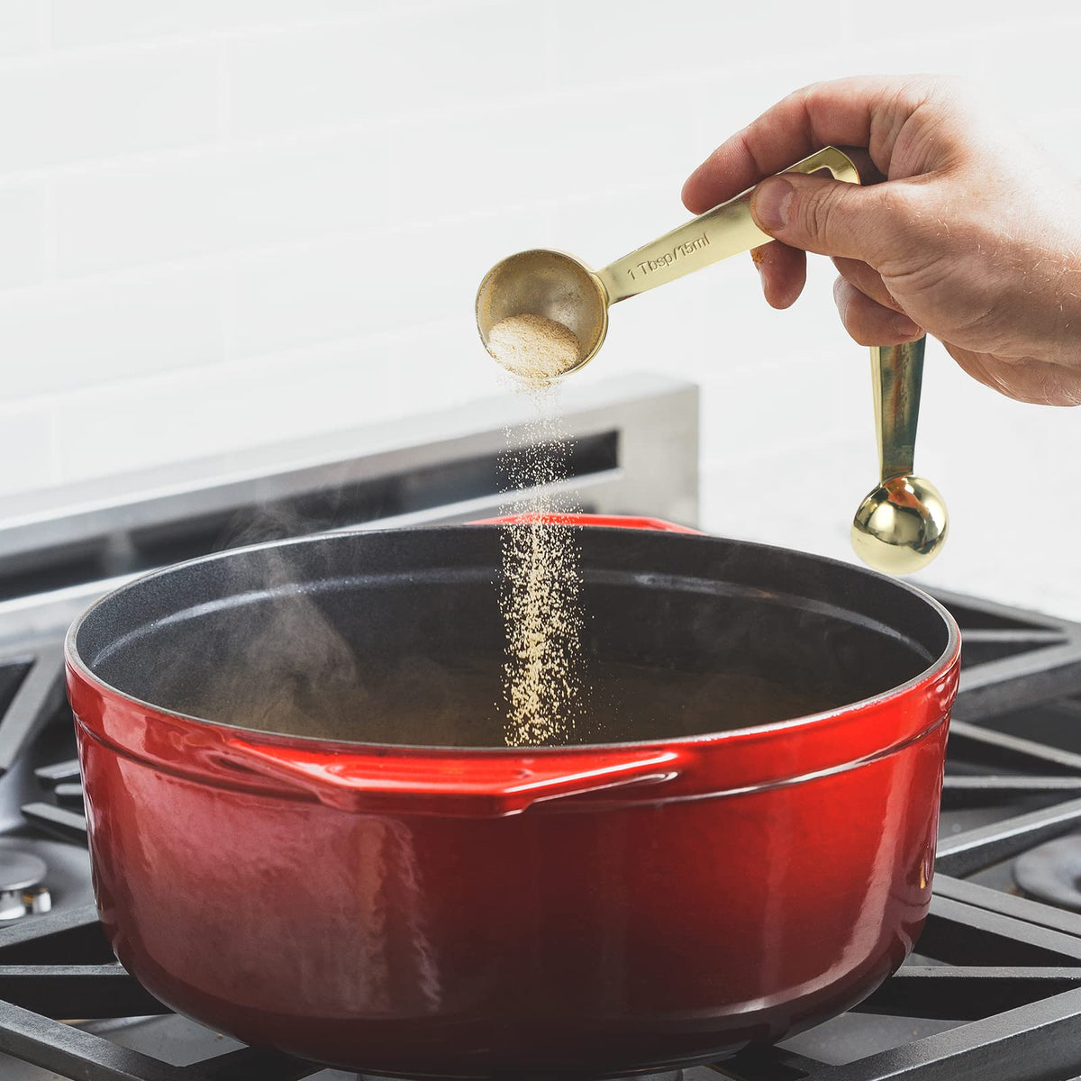 Esie Houzie gold measuring spoons 1/4 teaspoon for precise spice and extract dosing.