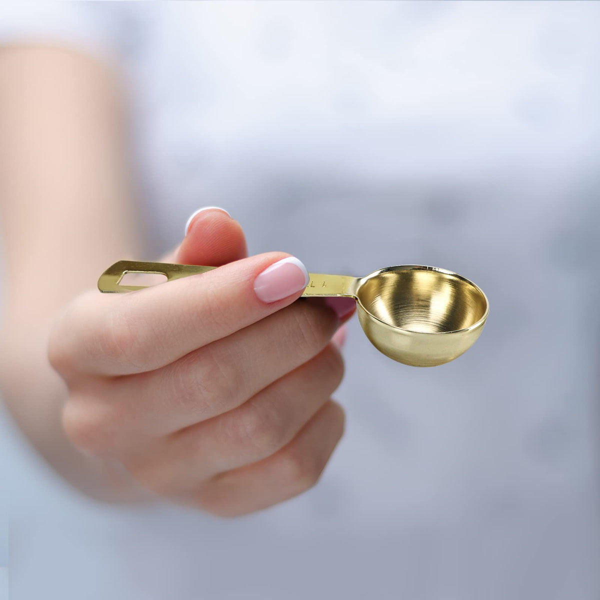 Esie Houzie gold measuring spoons 1 tablespoon durable stainless steel finish.