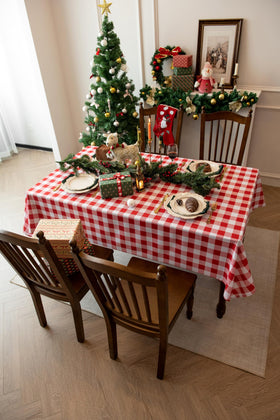 Essifunia checkered tablecloth draped on a worn table for protection