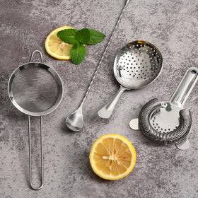 Etens fine mesh strainer filters pulp for pristine cocktails.