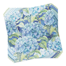 Beach party setup with blue hydrangea napkins for coastal entertaining.