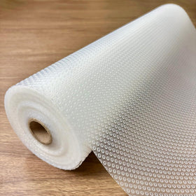Evaland shelf liner unrolled on counter showing clear non-slip surface for cabinet protection