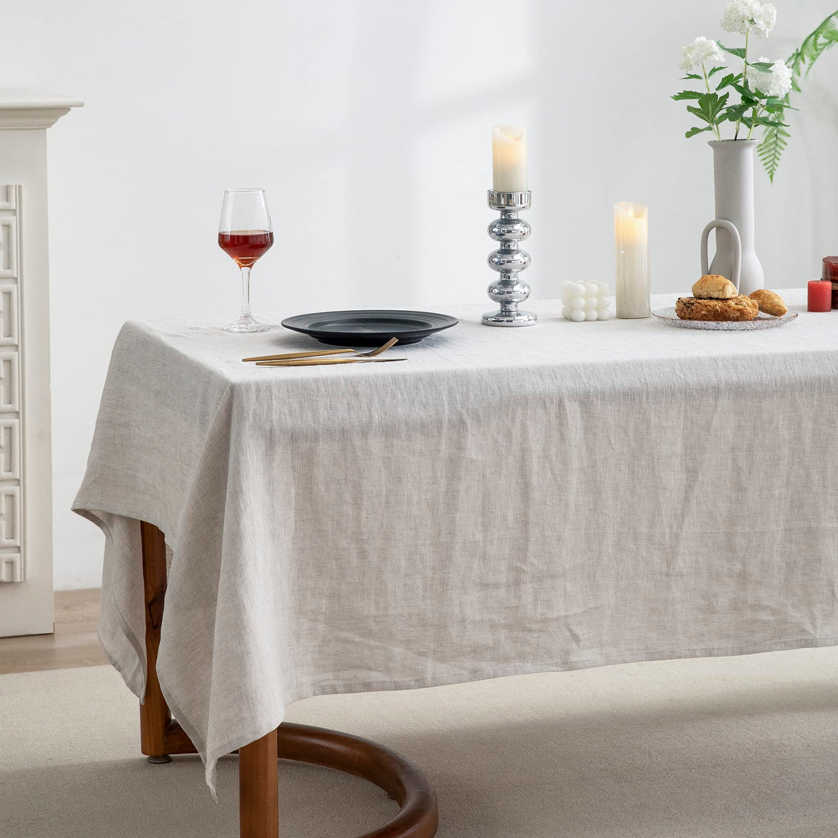 EVERLY linen tablecloth being machine washed demonstrates easy care.