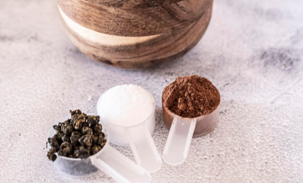 Existing Beauty spoons pictured with coffee for measured grounds.