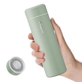Exllena small bottle Sage Green in hand for on-the-go hydration.