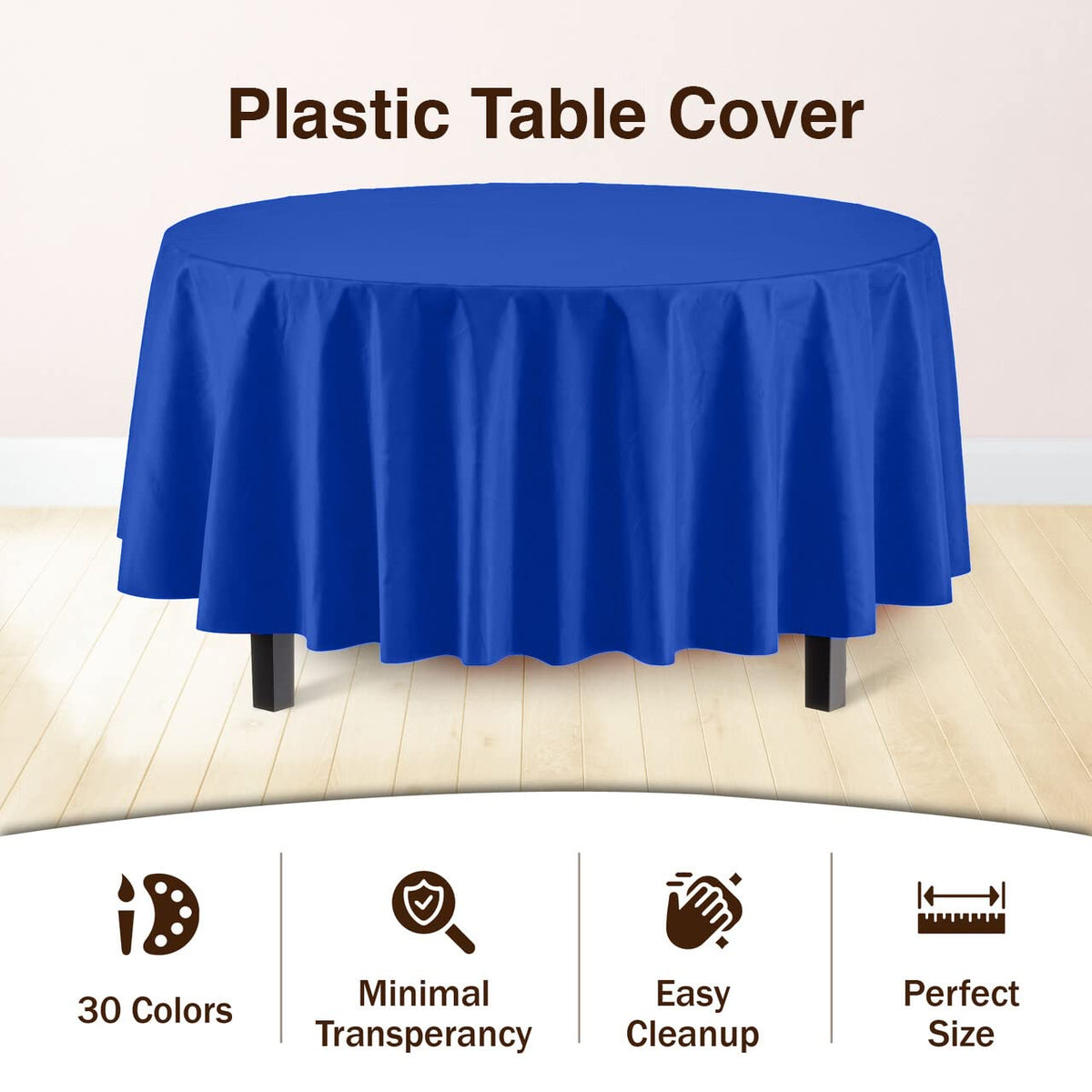 Exquisite round table setting with dark blue tablecloth ready for guests.