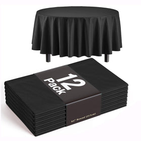 Exquisite 84-inch round black tablecloth laid flat for spill protection.