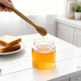 Exrmiae olive wood honey dipper easy to clean and air-dry after use.