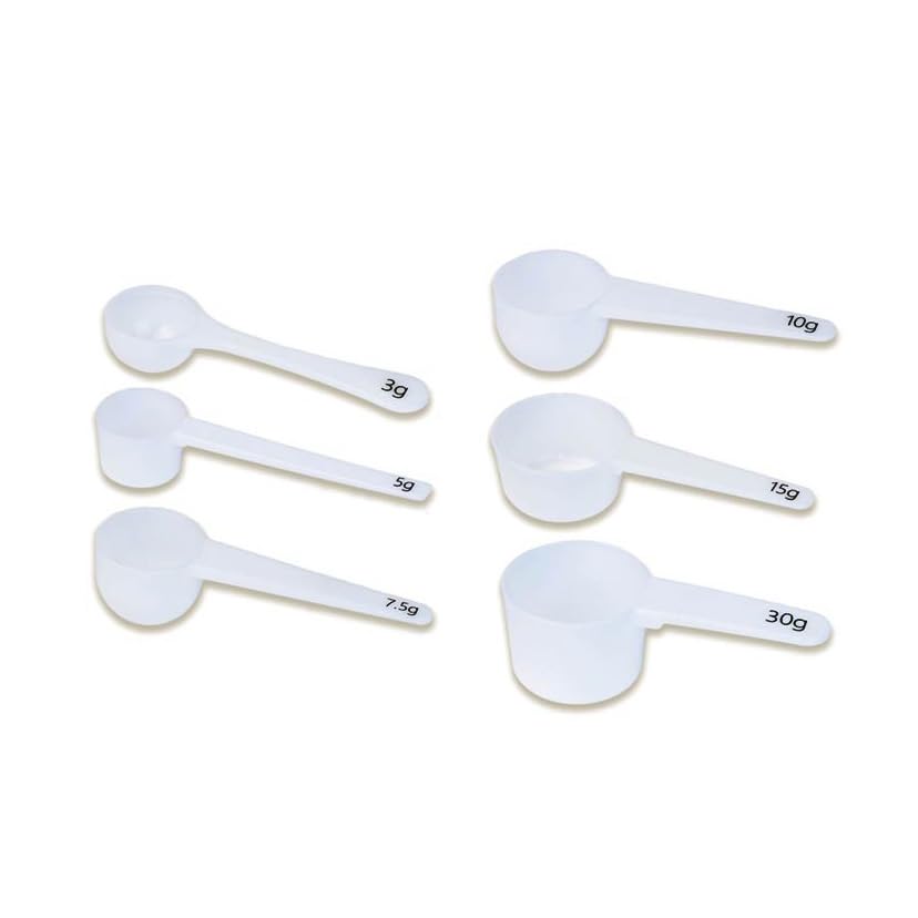 Extrakt Manufaktur Hamburg 3g spoon labeled for accurate dosing of powders or liquids.