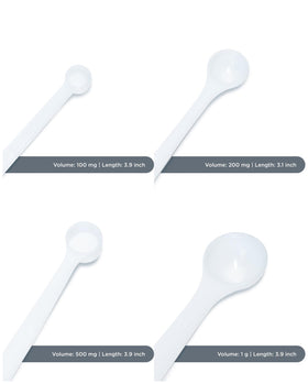 Extrakt Manufaktur Hamburg 1 g round white spoon for 1 g measurements.